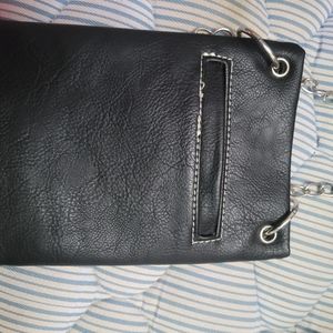 Leather crossbody bag with chain strap